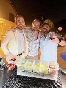 Three men enjoying an event served by Thee House of Drinks