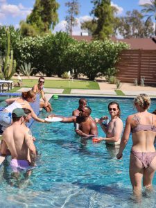 Guests enjoying mobile bar service at a poolside event in Arizona